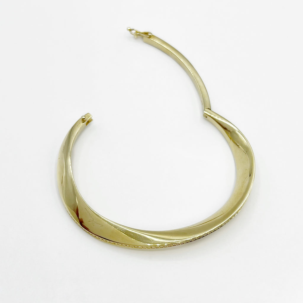 Golden Bangle Bracelet with White Sapphires