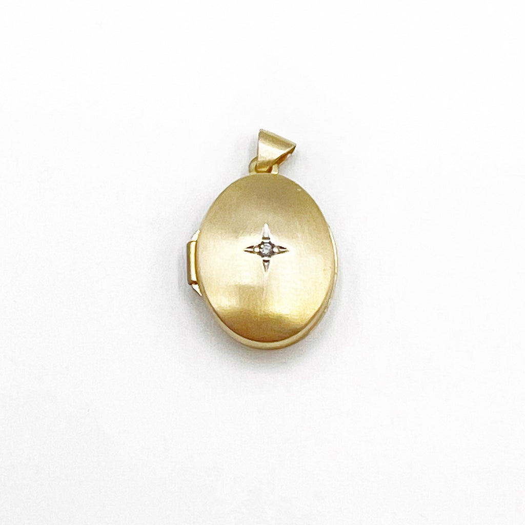 14 Karat Yellow Gold Diamond Oval Locket