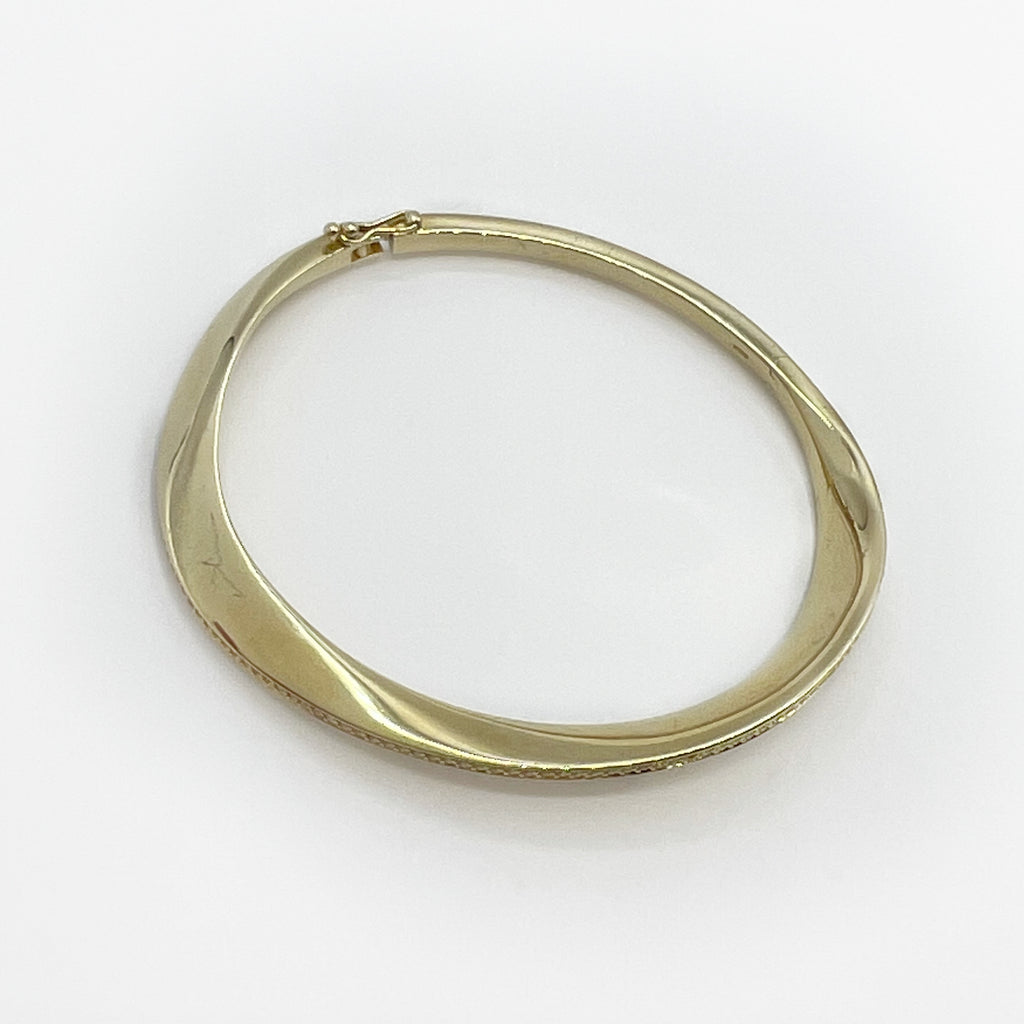 Golden Bangle Bracelet with White Sapphires