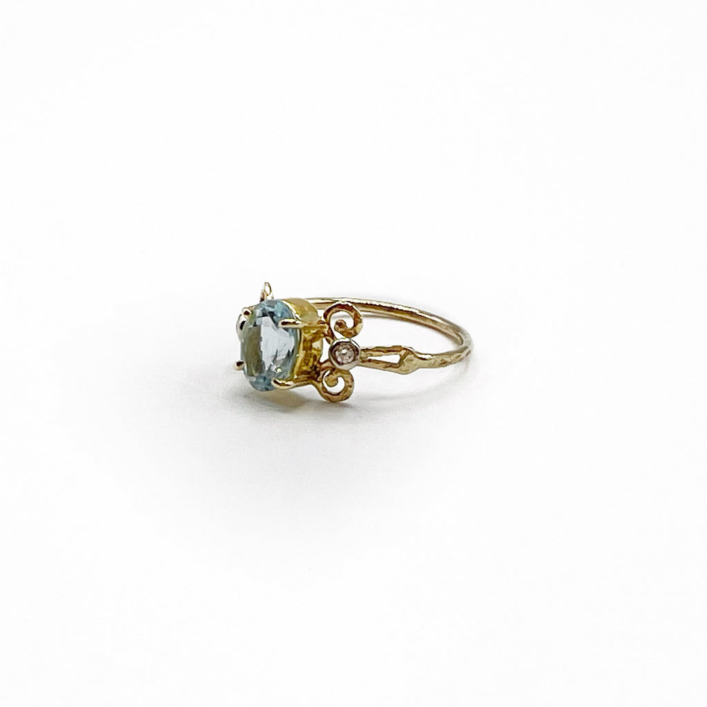 Elegant Filigree Oval Aquamarine and Diamond Ring