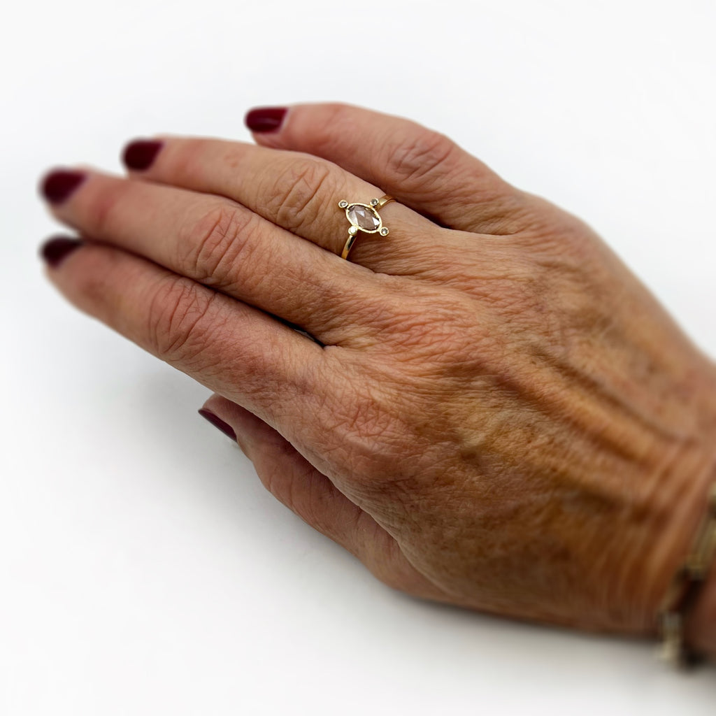 Orbit Diamonds 18 Karat Yellow Gold Ring