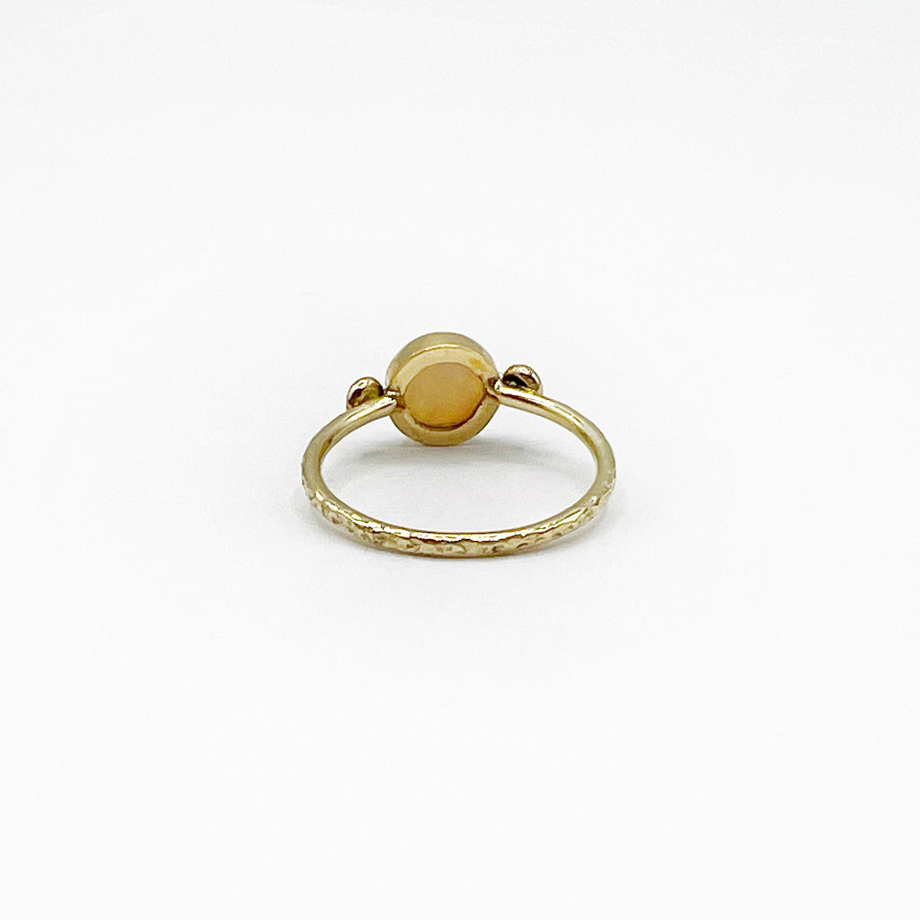Round Opal accented with 2 Diamonds Ring