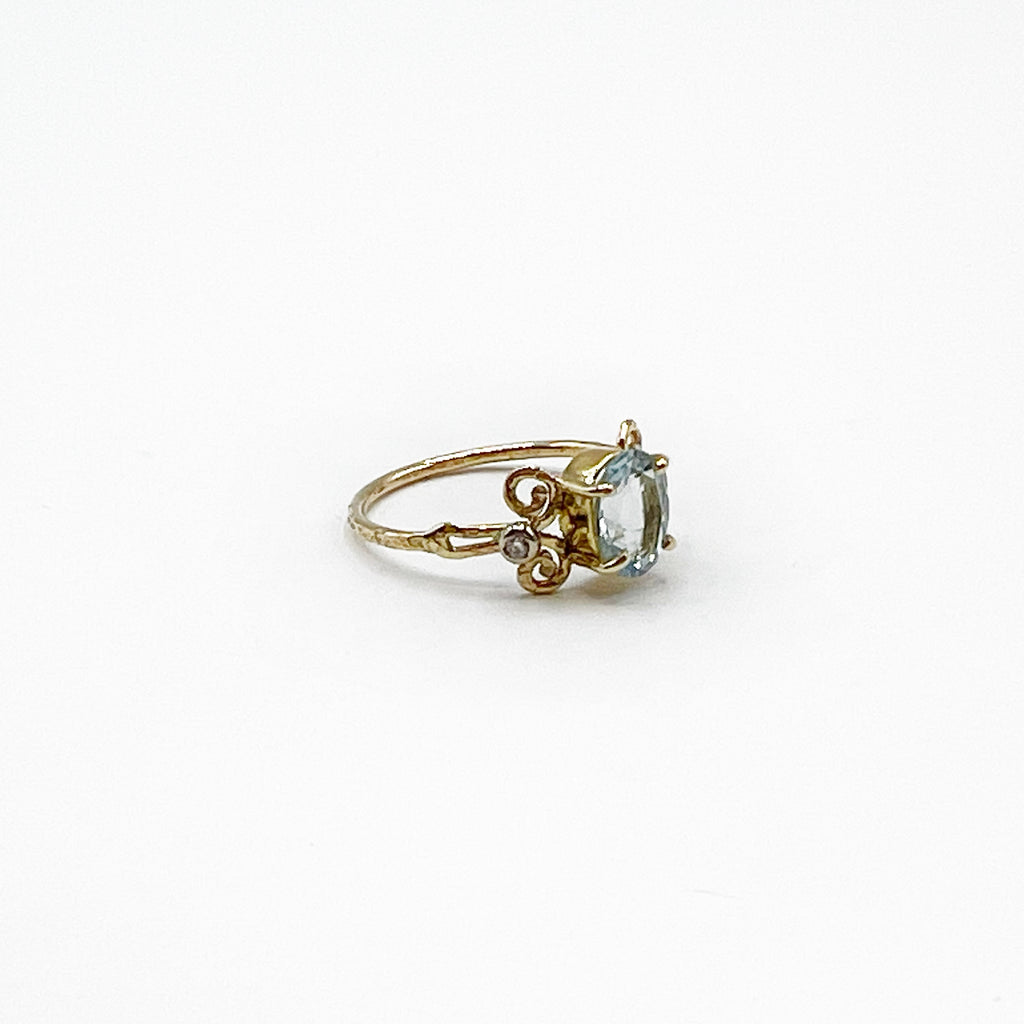 Elegant Filigree Oval Aquamarine and Diamond Ring
