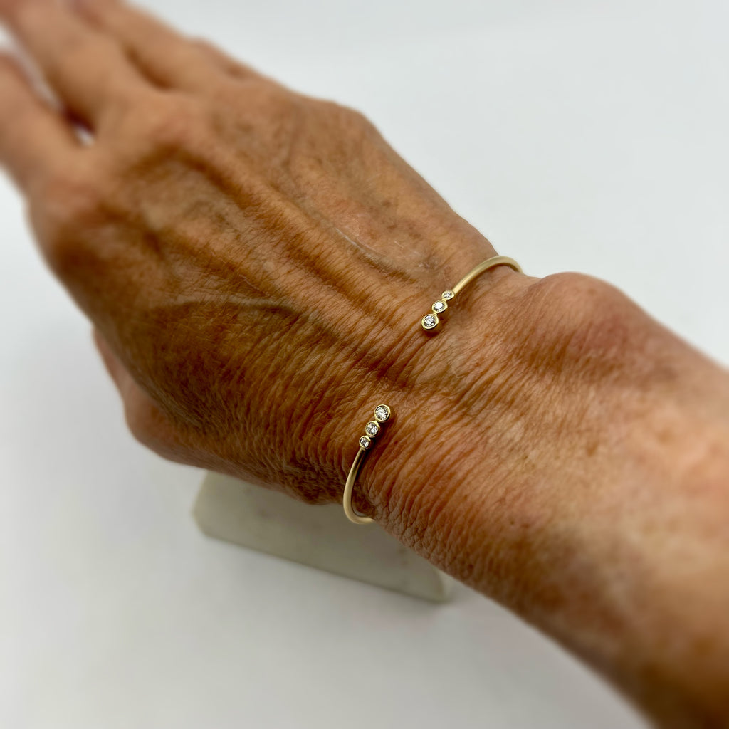 Open Bangle With Trio of Round Diamonds