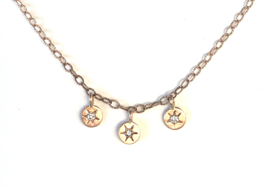 Triple Star Sparkling Constellation floating on a gold chain