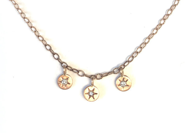Triple Star Sparkling Constellation floating on a gold chain