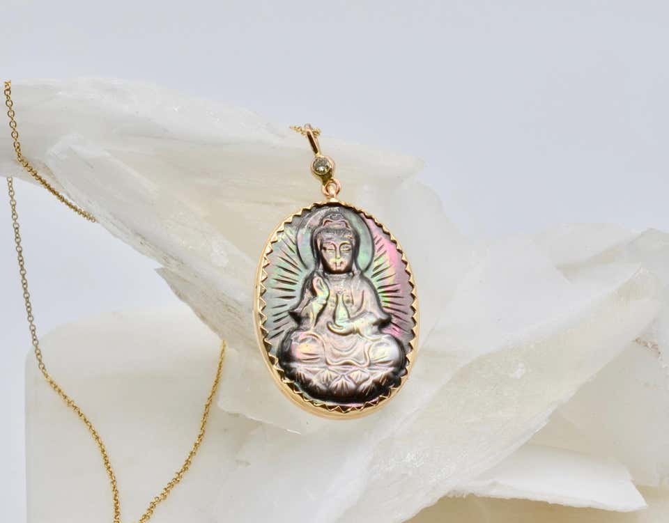 Mother of Pearl Buddha Set in 14 Karat Gold with Diamond Bale Necklace
