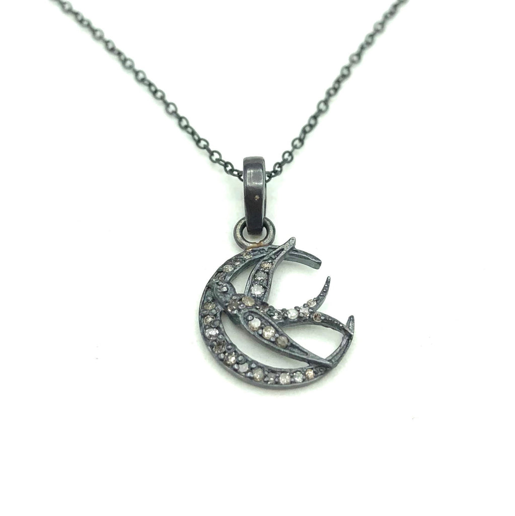 bird and moon silver and diamond pendent