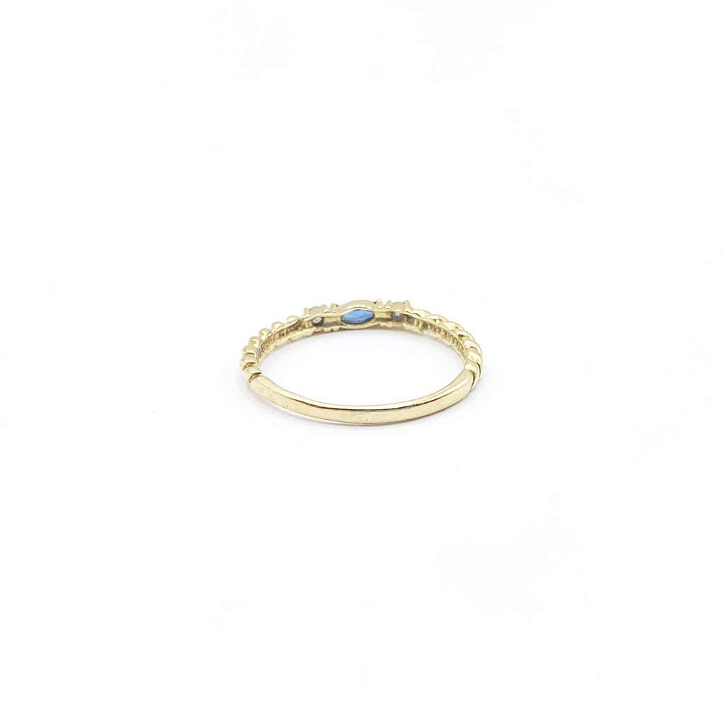 Spiraled Golden Ring with Diamonds and a Sapphire