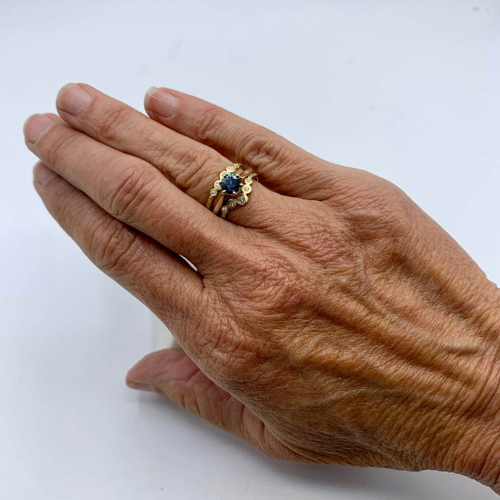 Sapphire Solitaire on a Golden Band