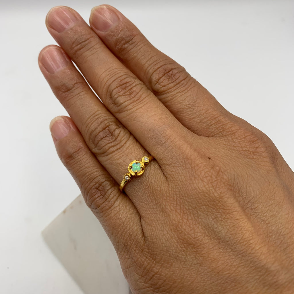 14 Karat Yellow Gold Ring with One Round Opal and 2 Round Diamonds