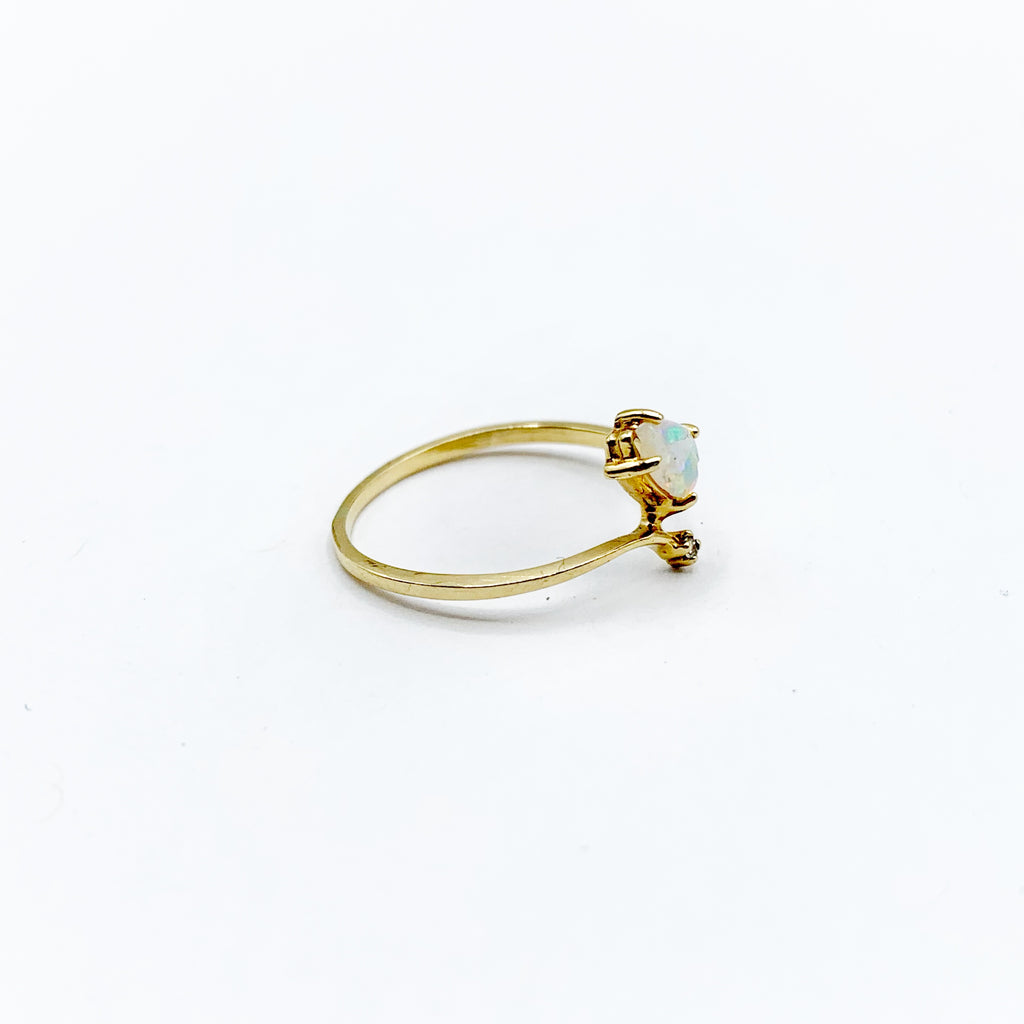 14 Karat Yellow Gold Ring with One Pear Opal and One Round Diamond