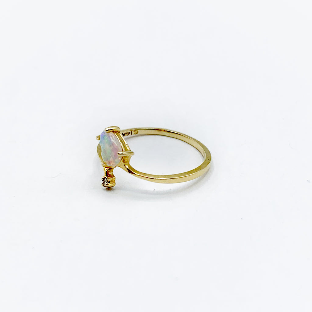 14 Karat Yellow Gold Ring with One Pear Opal and One Round Diamond