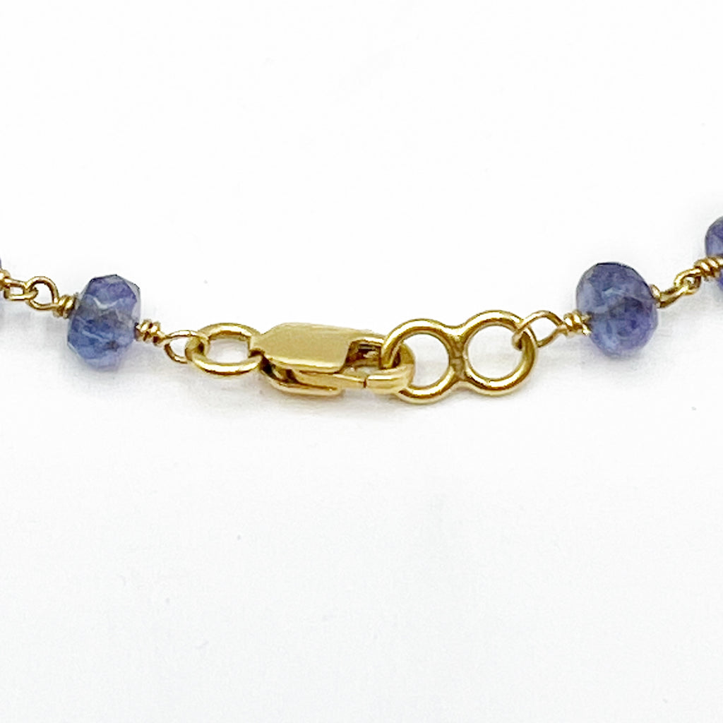 Jellybean Tanzanite and Emeralds Floating on Golden Wire