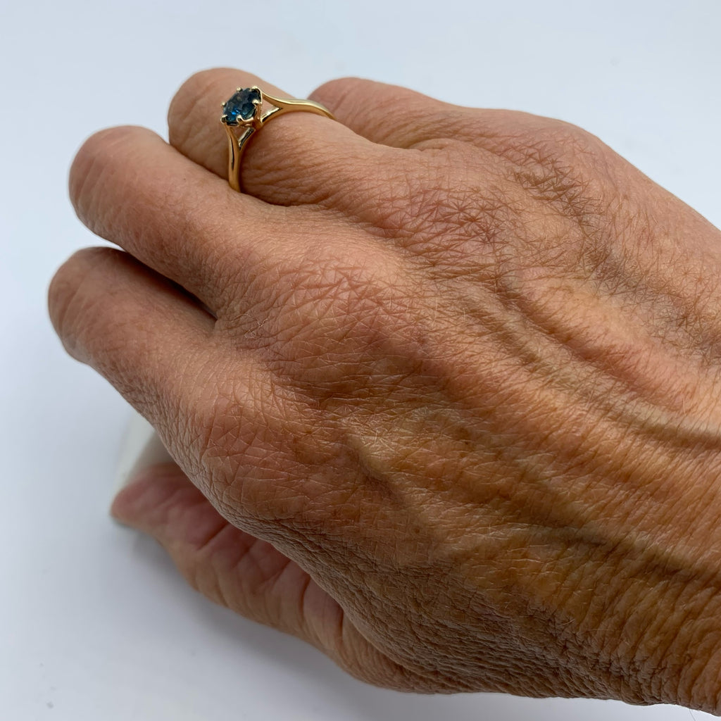 Deep Blue Sapphire on a Golden Band