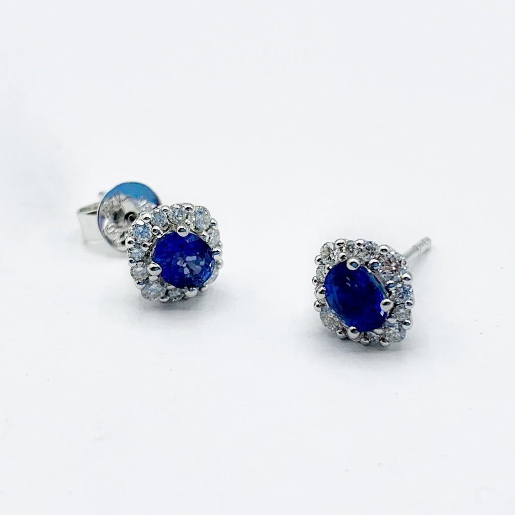 Deep Blue Sapphires in a Halo of Diamonds and Winter White Gold