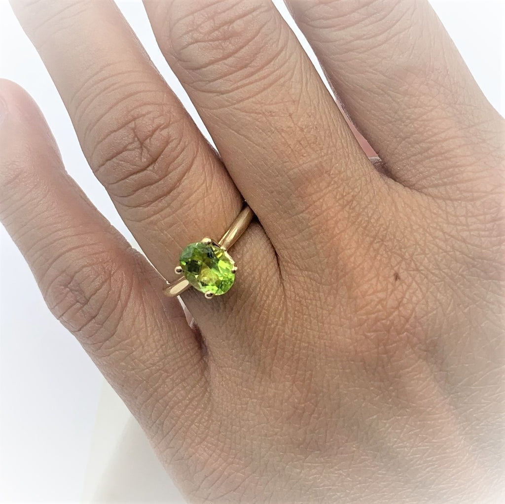 Peridot Gem on a Golden Band
