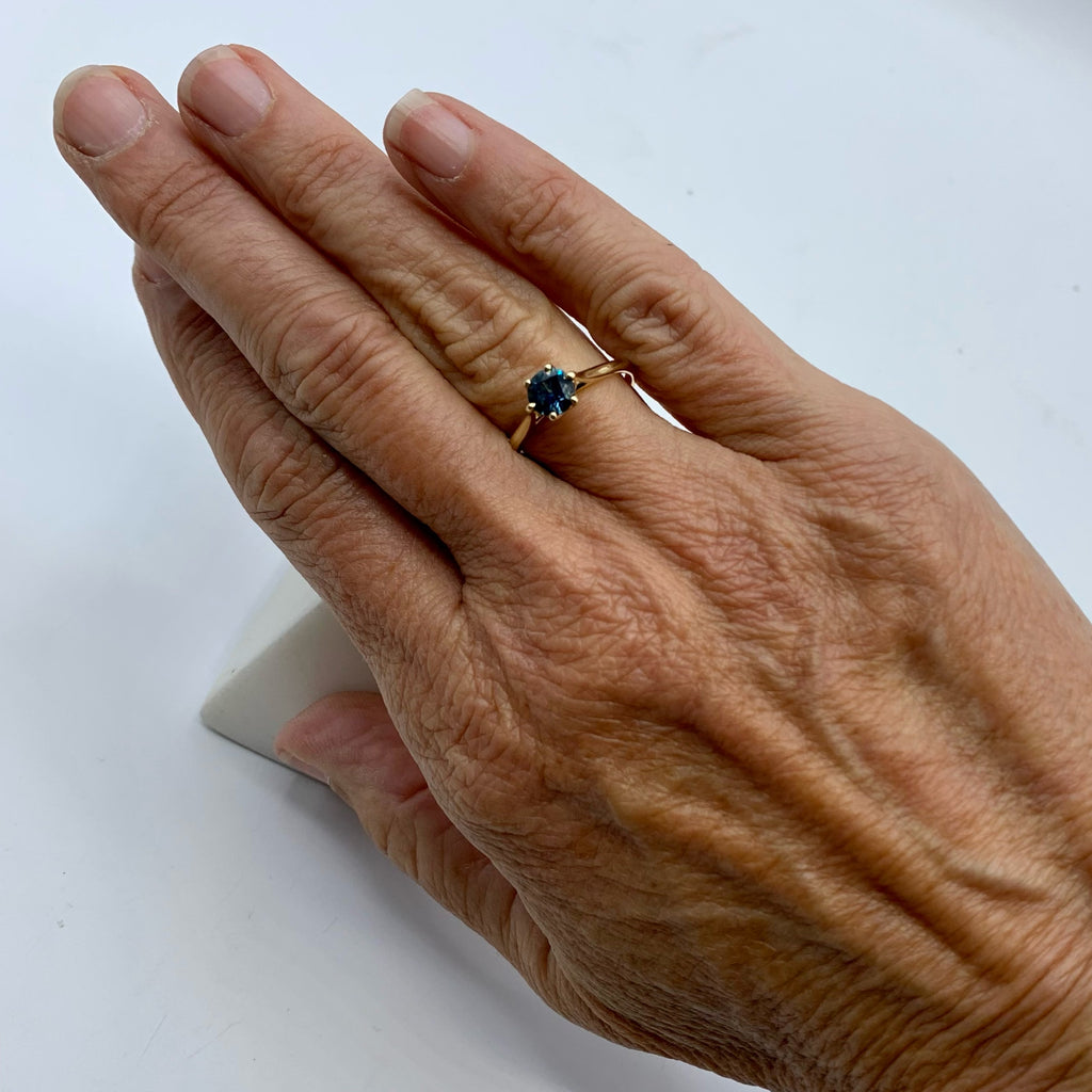 Deep Blue Sapphire on a Golden Band