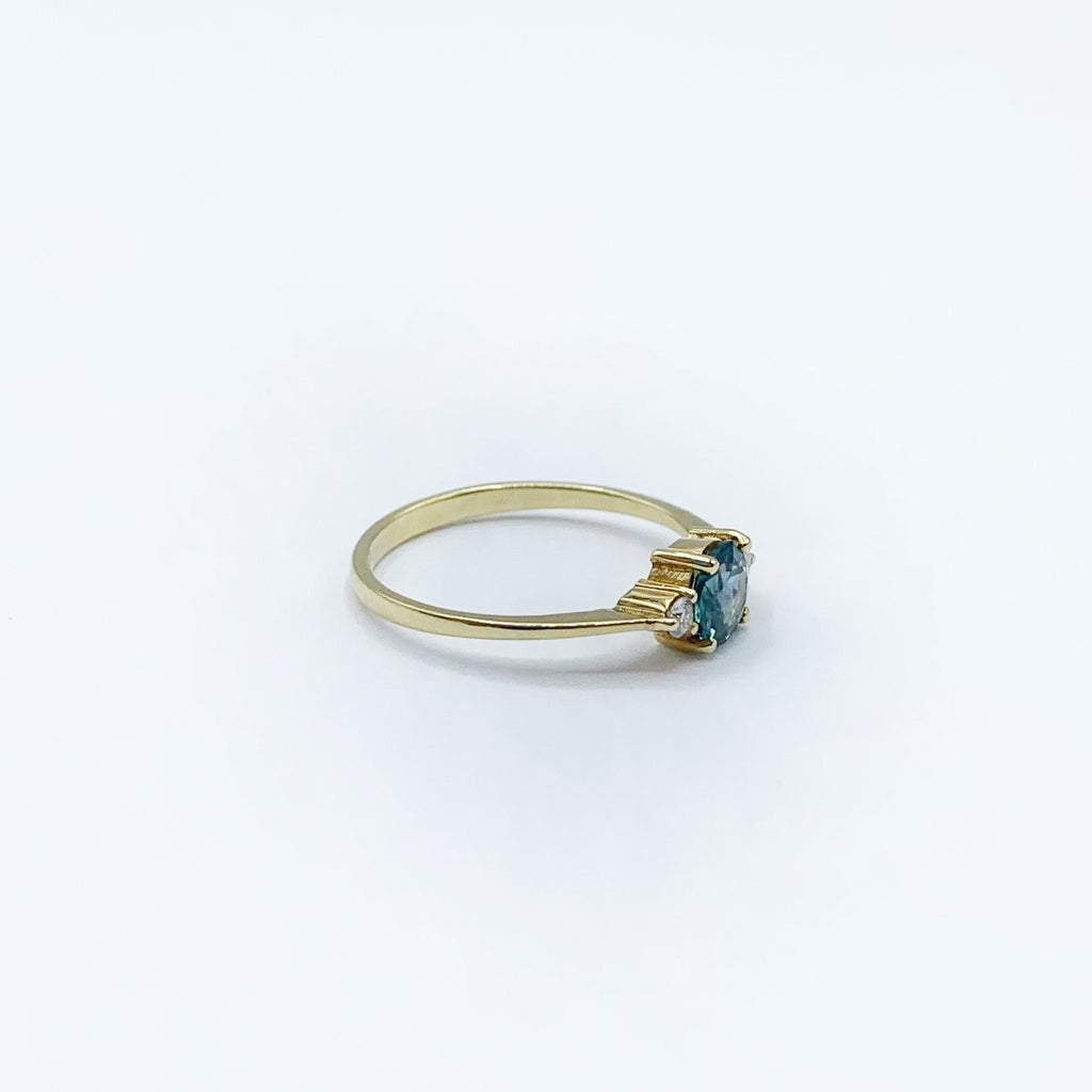 14 Karat Yellow Gold Ring with Round Montana Sapphire