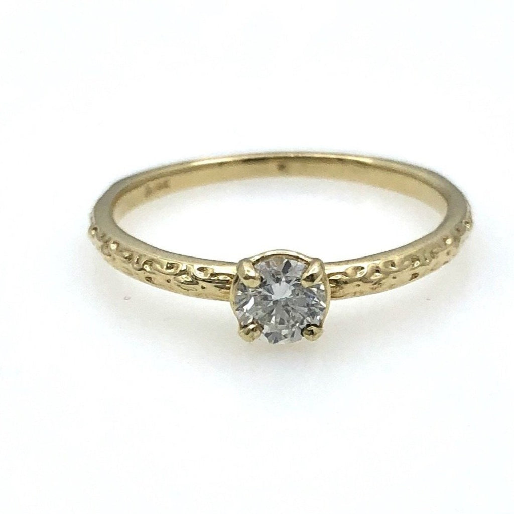 Intricate Engraved Band with a Solitaire Diamond