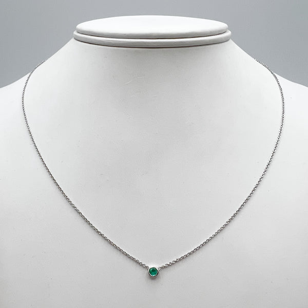 Bright Green Emerald on Shimmering White Gold