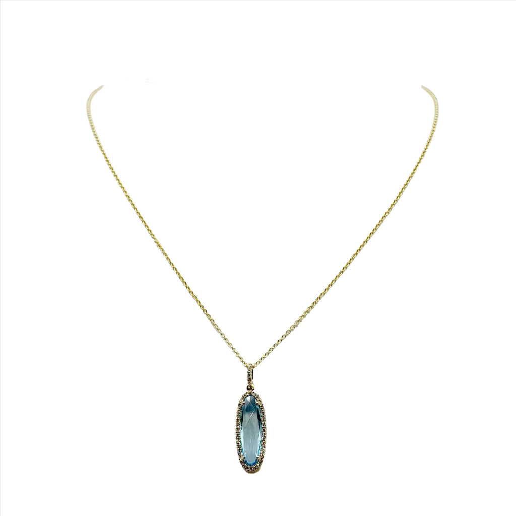 Blue Oval Topaz Surrounded by Teensy Diamonds