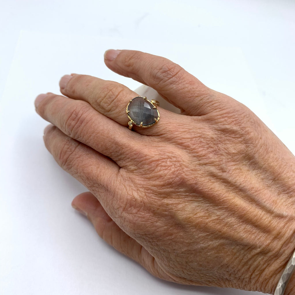 Icy Blue Aquamarine Clutched in Gold