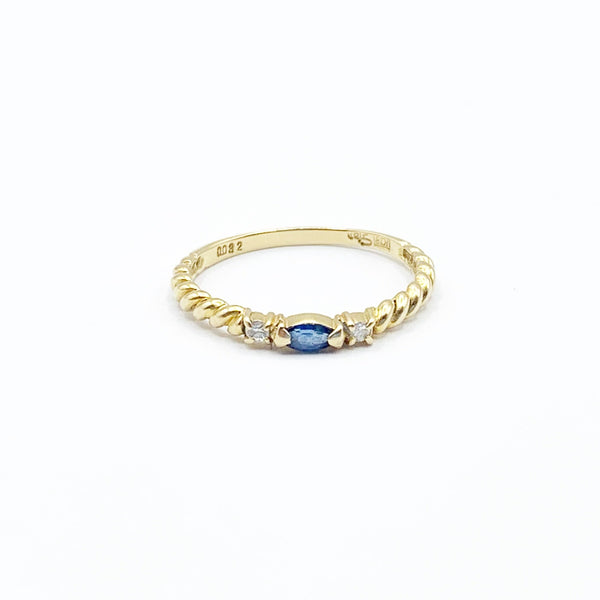 Spiraled Golden Ring with Diamonds and a Sapphire