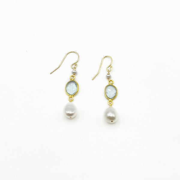 Light Blue Topaz and Pearl set in Gold