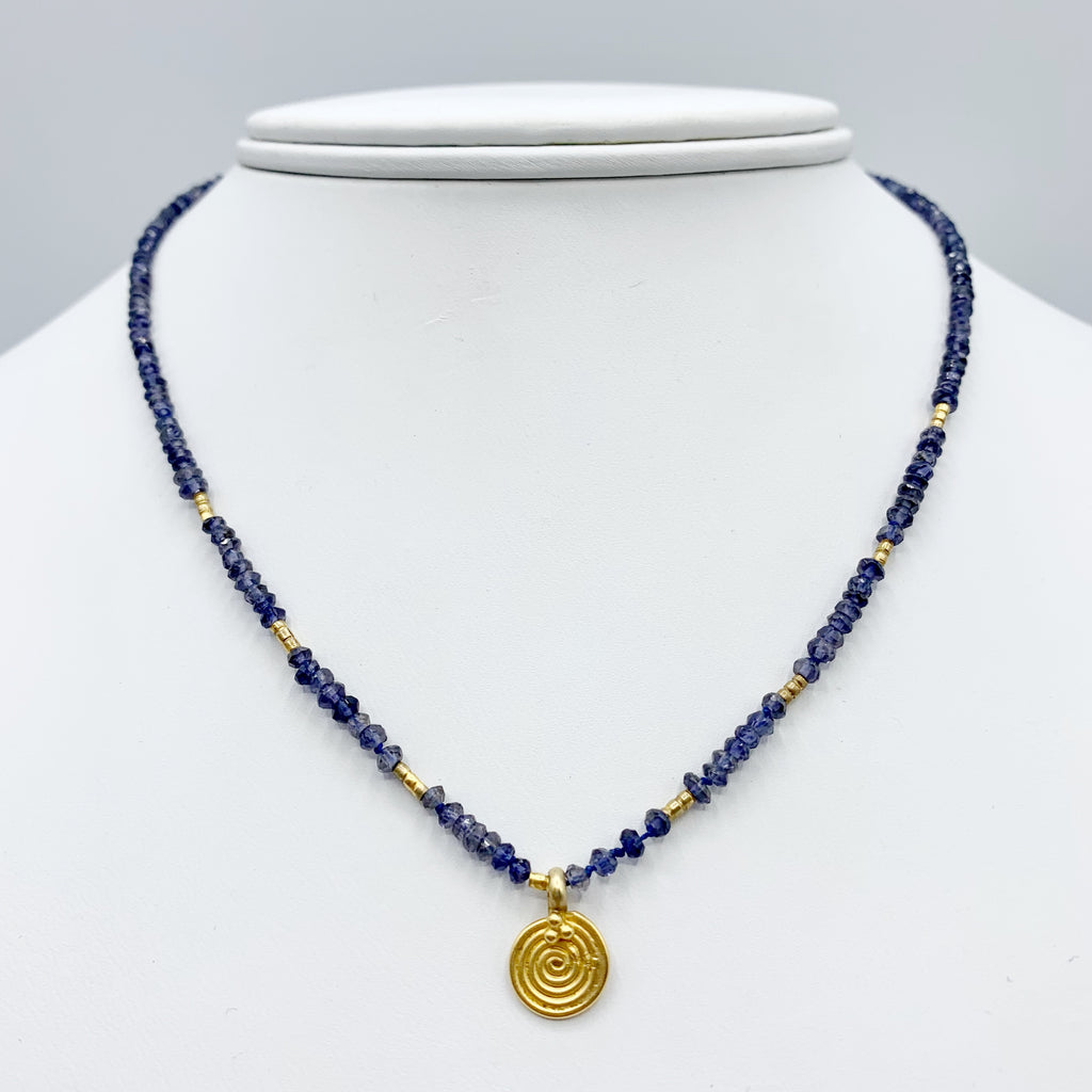 Deep Blue Beads with a Golden Sun Disk