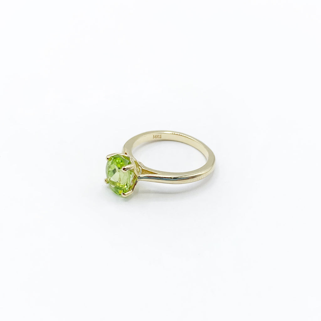 Peridot Gem on a Golden Band
