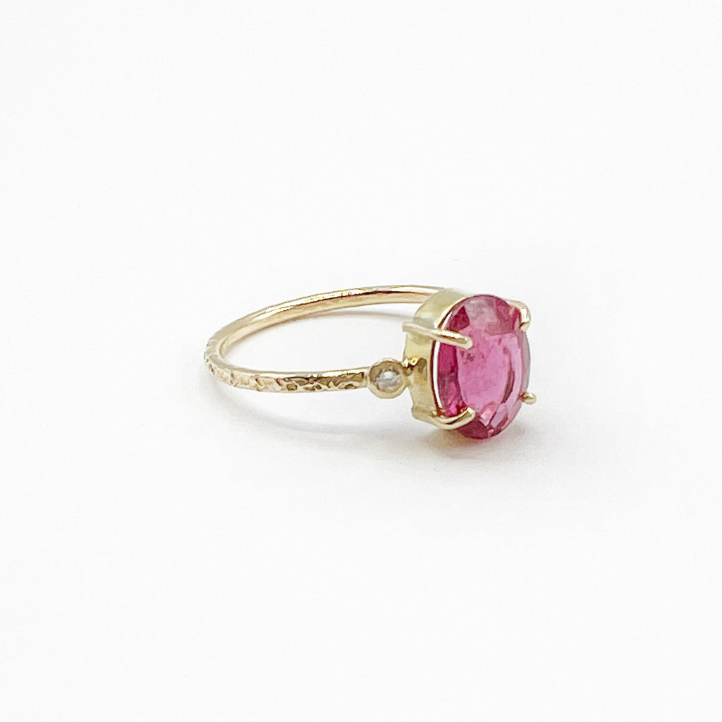 Oval Rubilite Tourmaline set in 14 Karat Yellow Gold with Diamonds