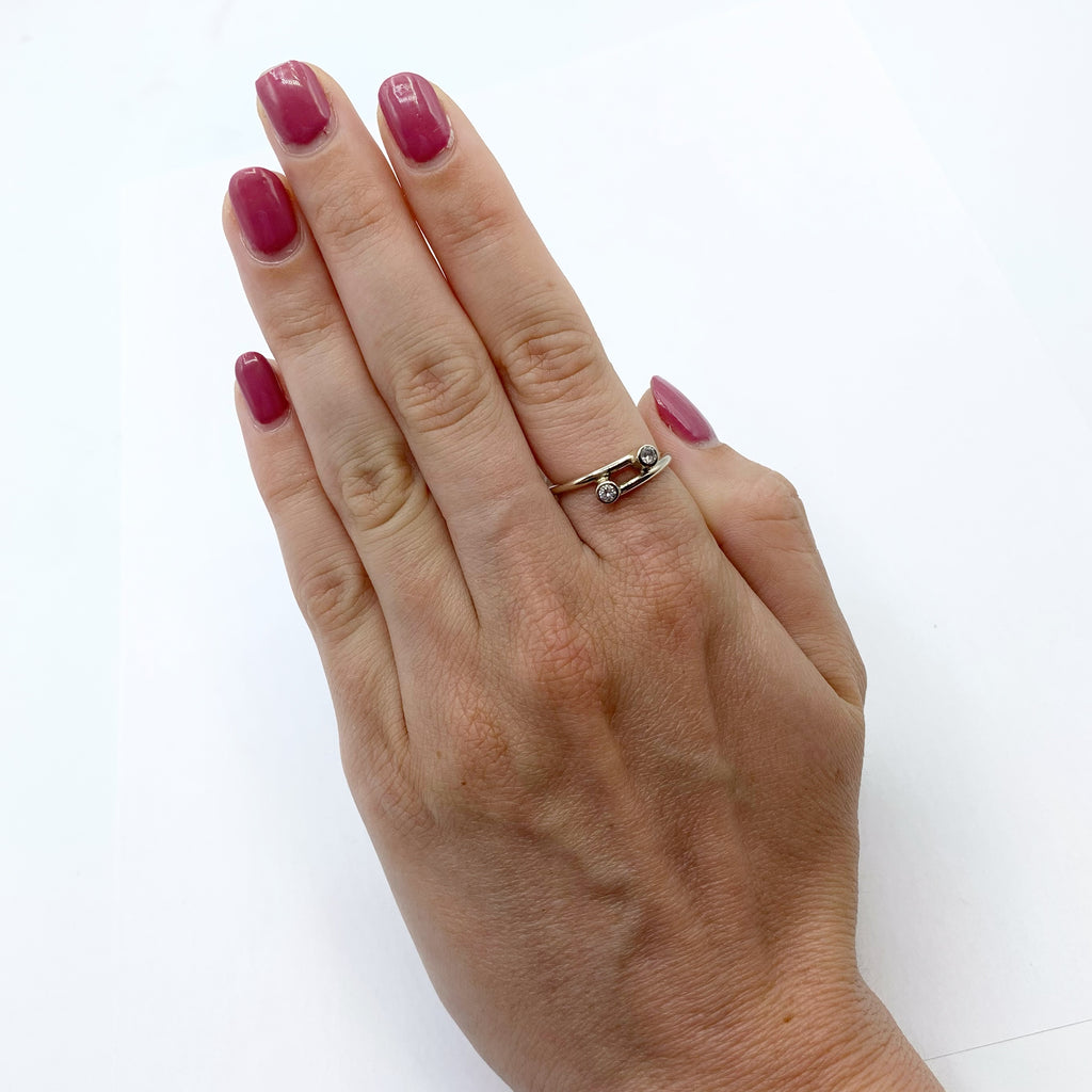 Two Diamonds on a Circlet of Gold