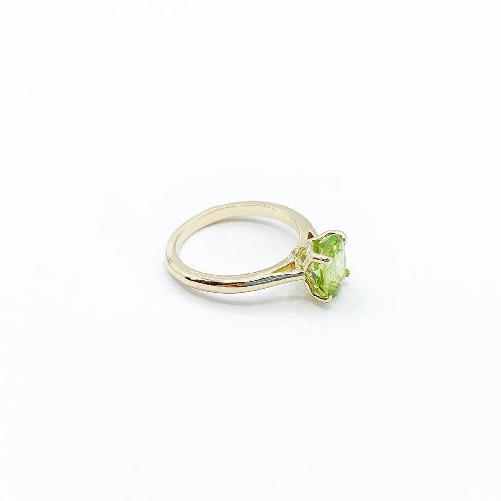 Peridot Gem on a Golden Band