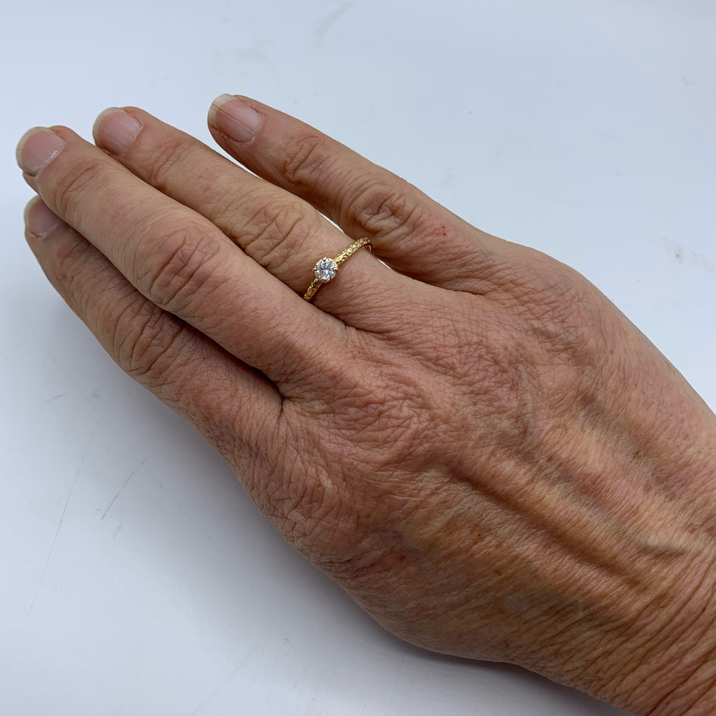 Intricate Engraved Band with a Solitaire Diamond