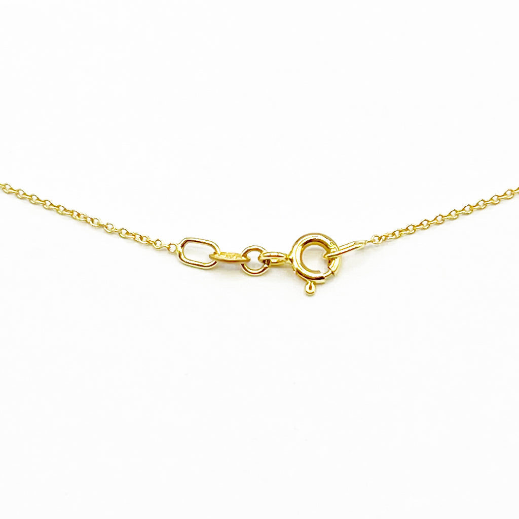 Bright Gold and Diamonds Floating on a Gold Chain