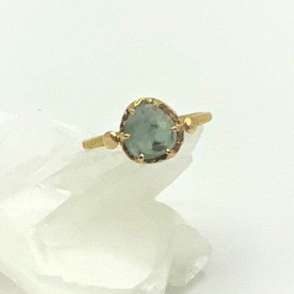 Icy Montana Sapphire on Hammered Gold
