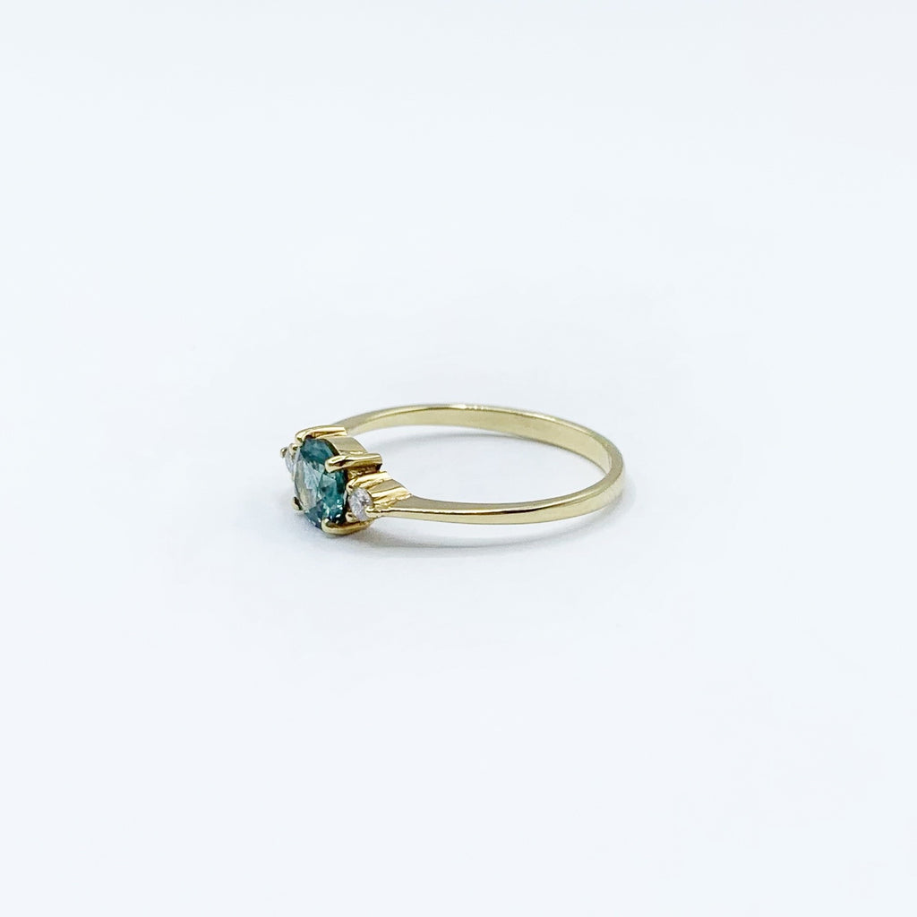 14 Karat Yellow Gold Ring with Round Montana Sapphire