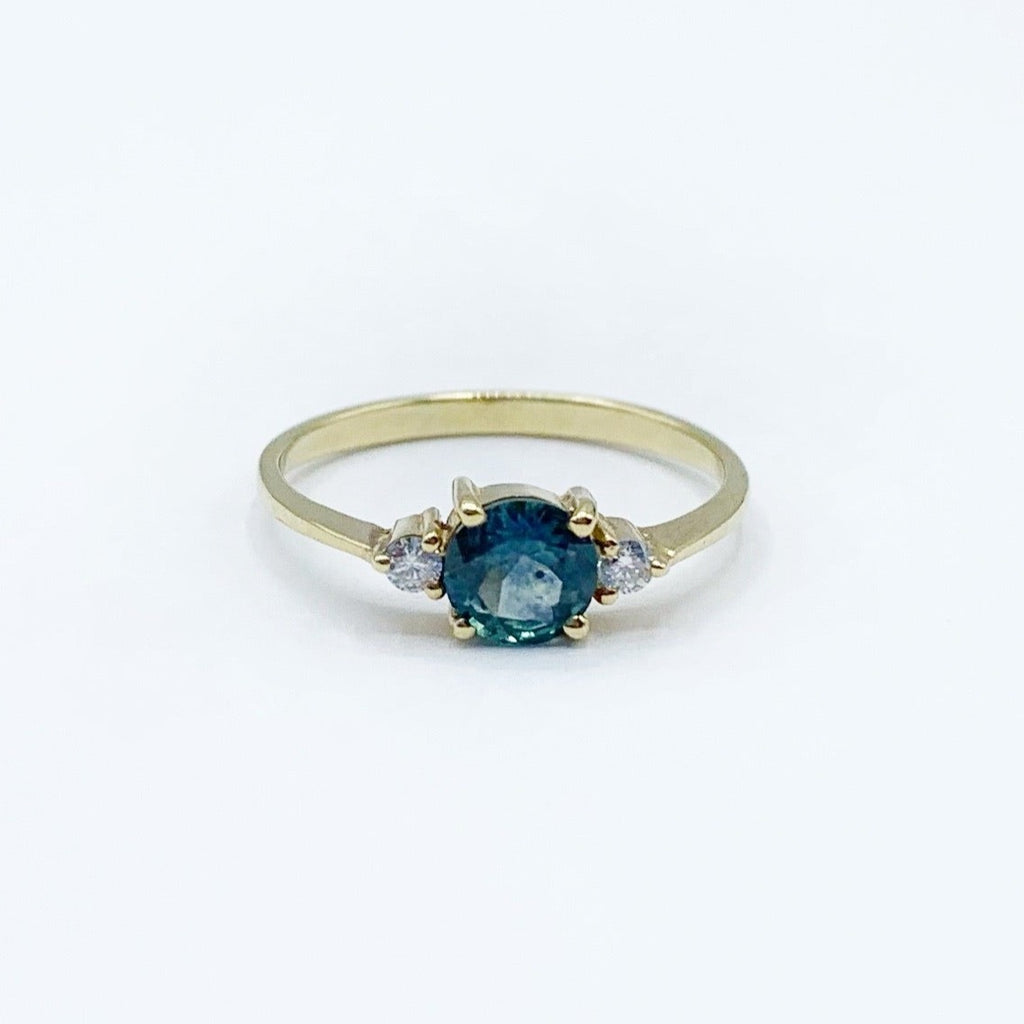 14 Karat Yellow Gold Ring with Round Montana Sapphire
