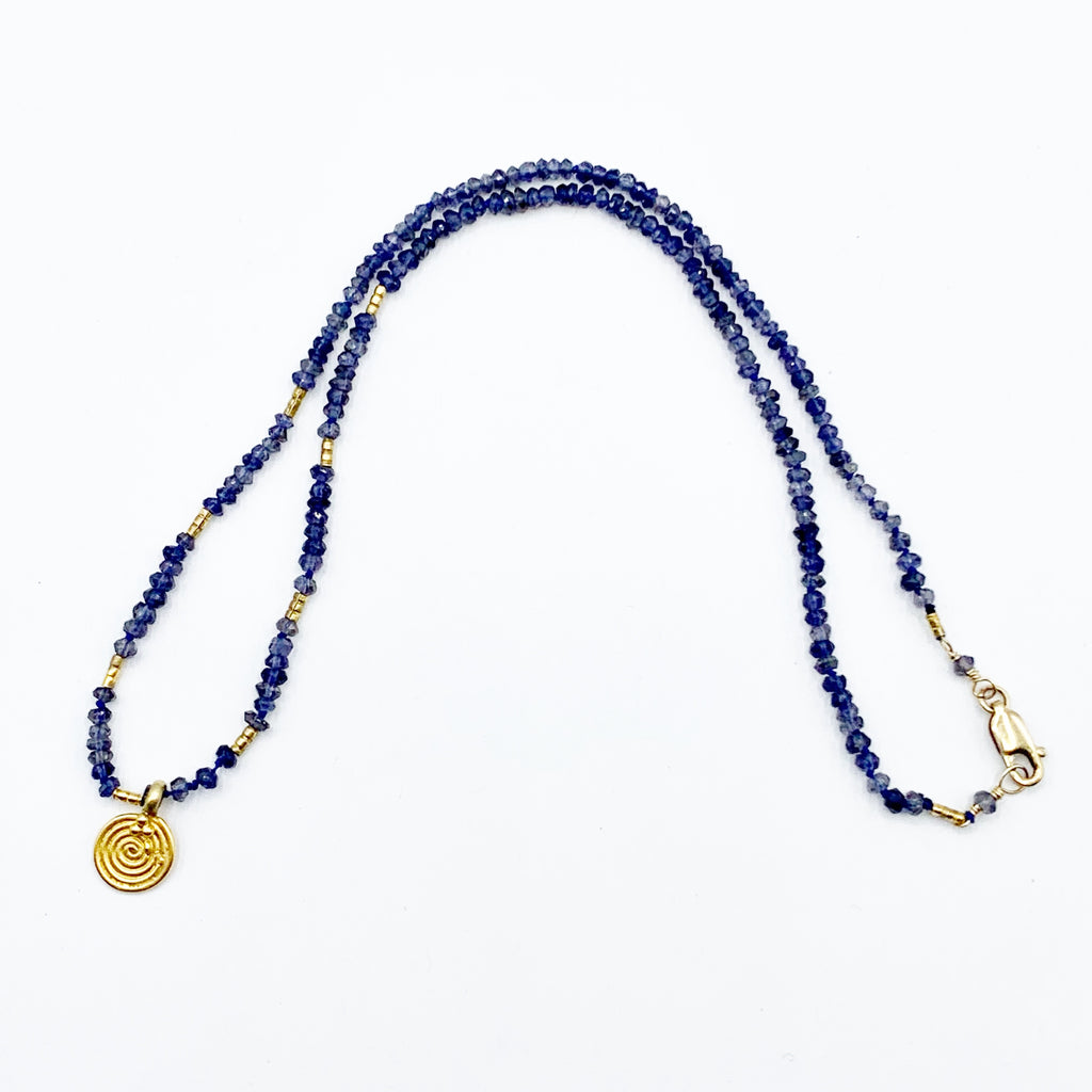 Deep Blue Beads with a Golden Sun Disk