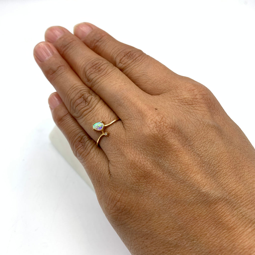 14 Karat Yellow Gold Ring with One Pear Opal and One Round Diamond