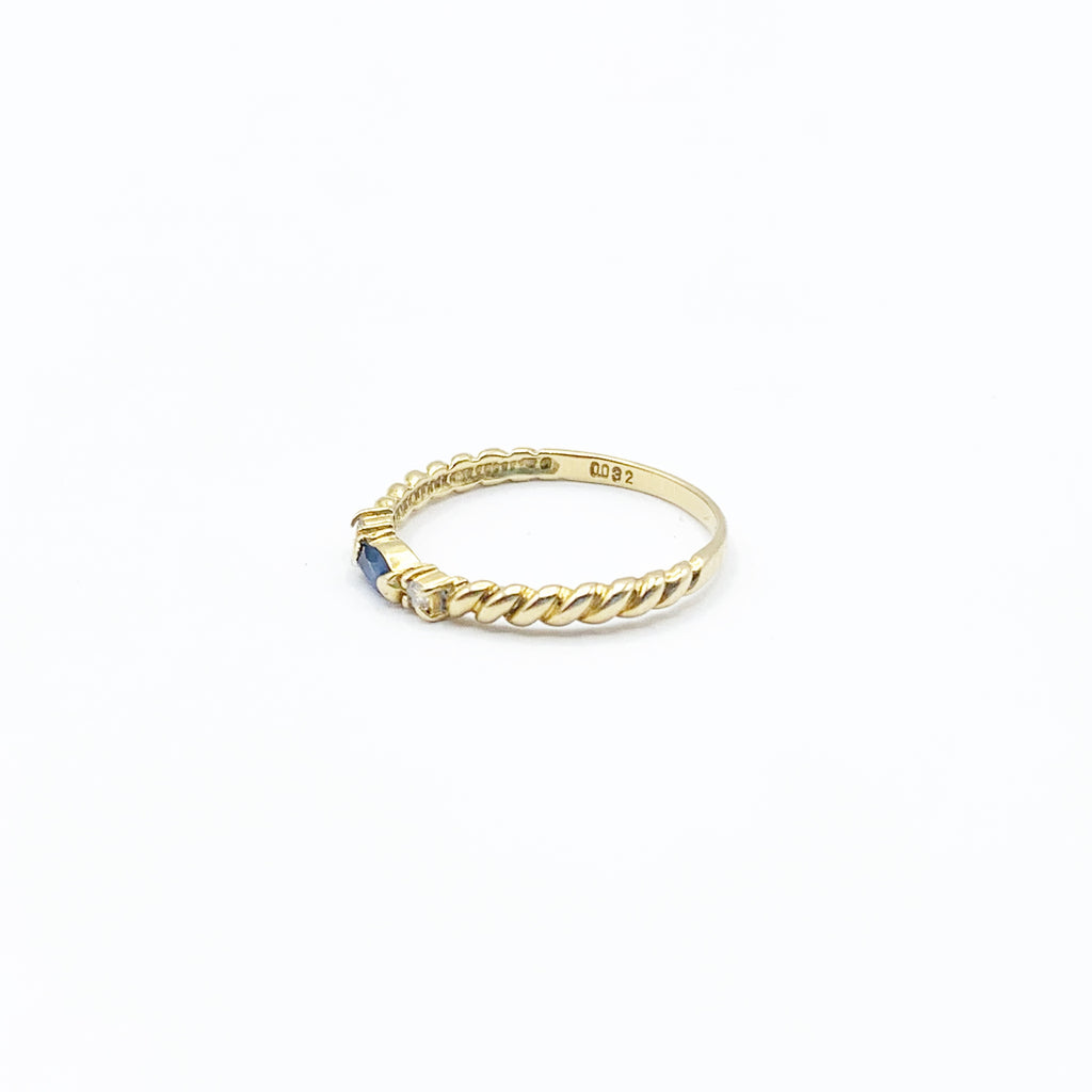 Spiraled Golden Ring with Diamonds and a Sapphire
