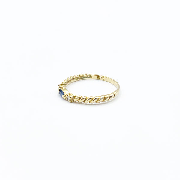 Spiraled Golden Ring with Diamonds and a Sapphire