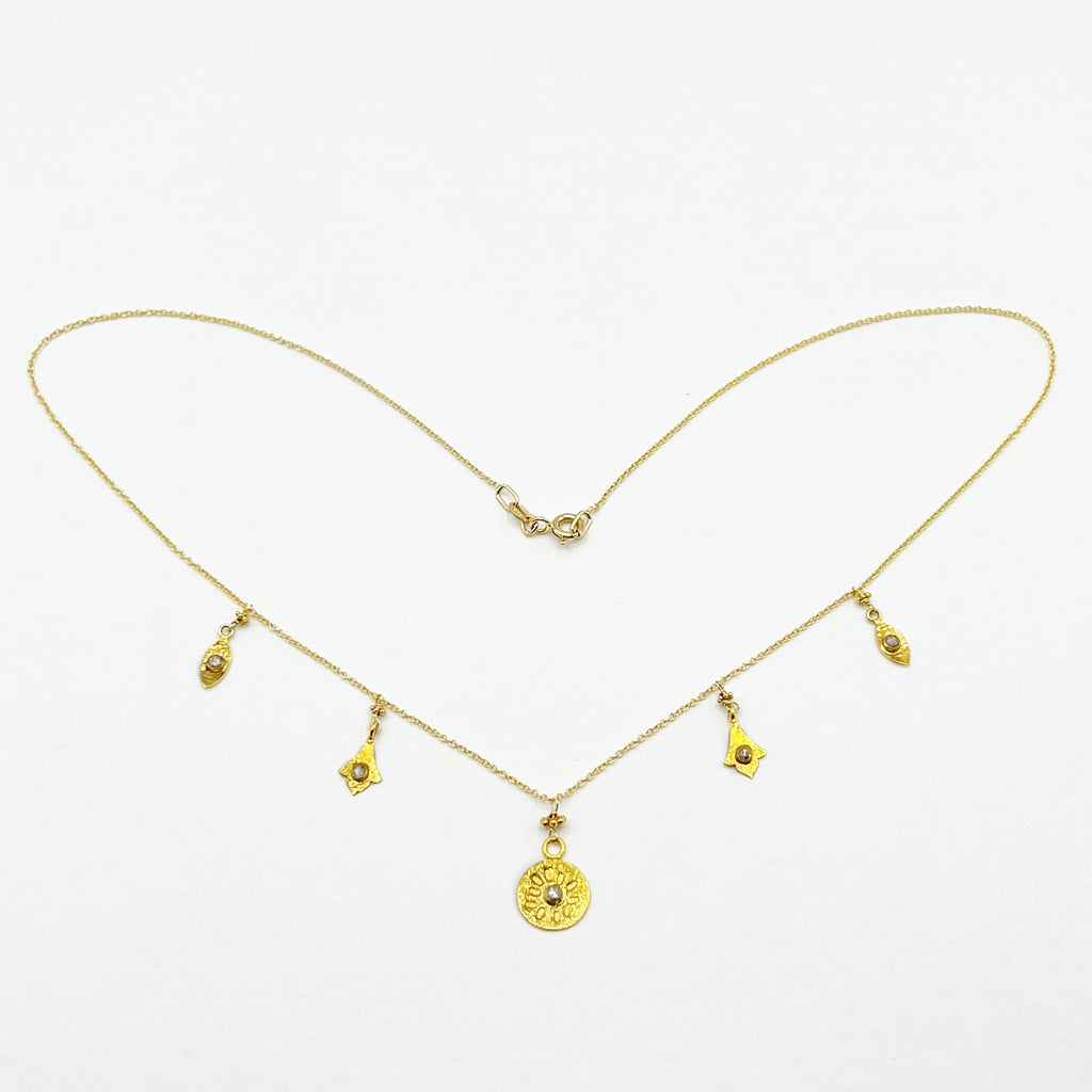 Bright Gold and Diamonds Floating on a Gold Chain