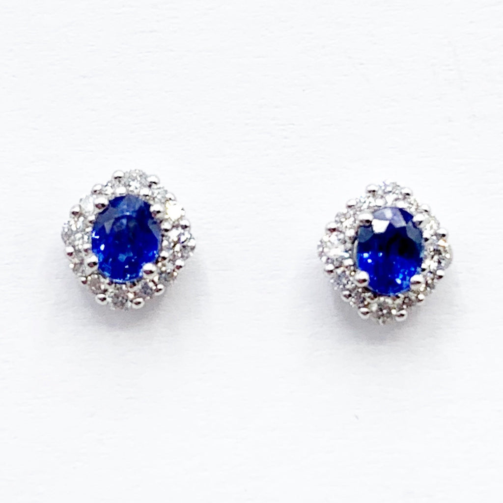 Deep Blue Sapphires in a Halo of Diamonds and Winter White Gold