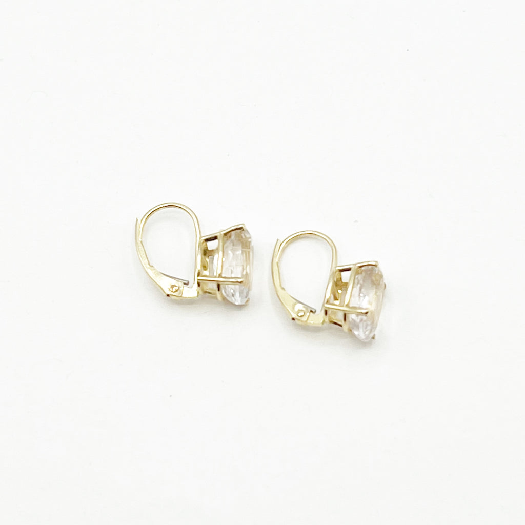 Clear Faceted Kunzite set in Gold