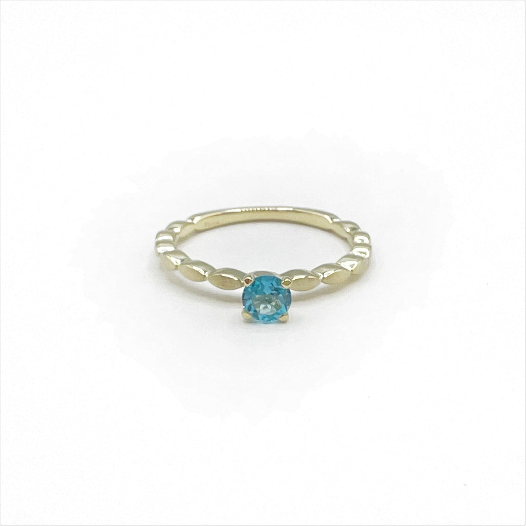 Blue Topaz Princess Ring on a Band of Tiny Pillows