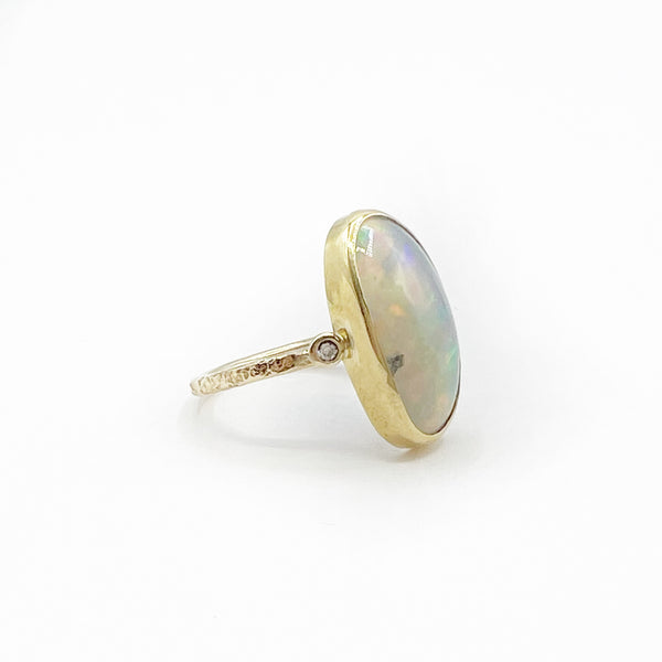 Ethiopian Oval 14 Karat Yellow Gold Ring with 2 Diamonds