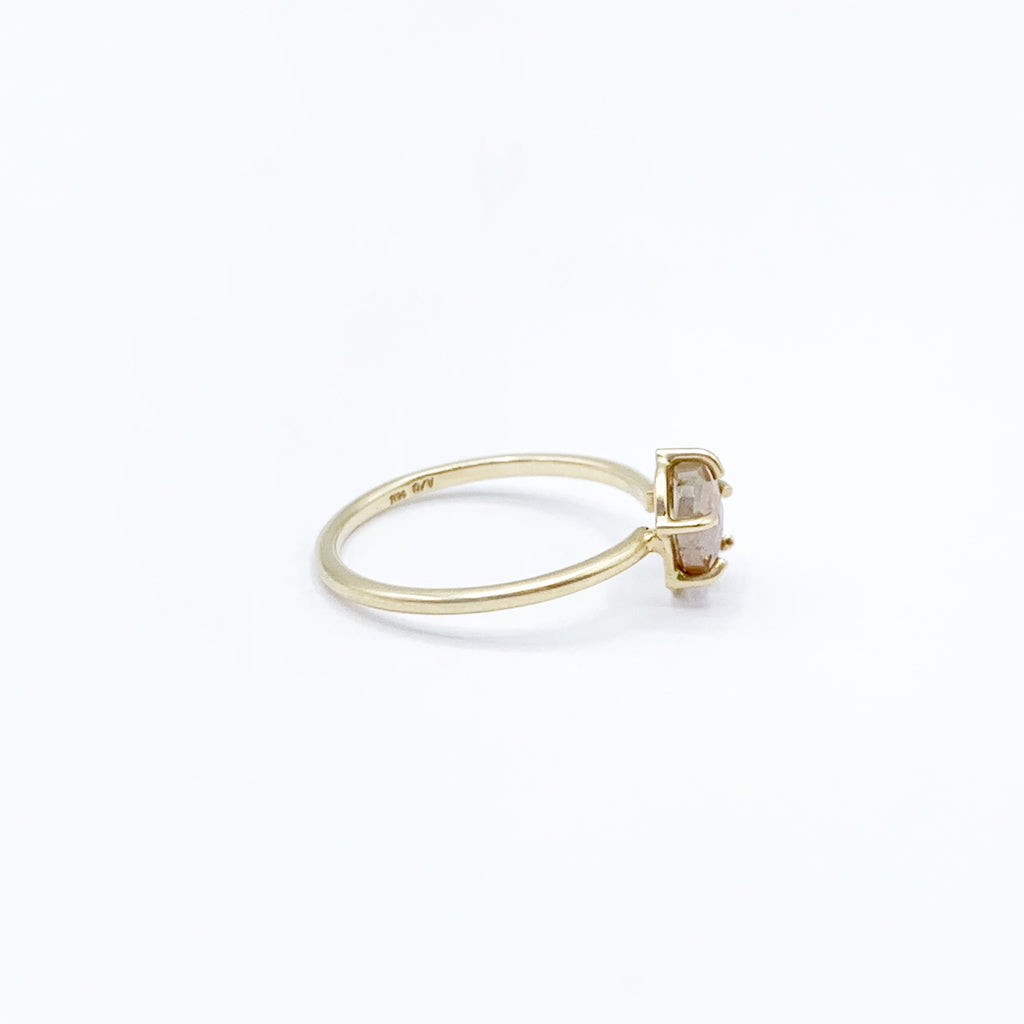 Delicate Pastel Diamond Captured in Gold