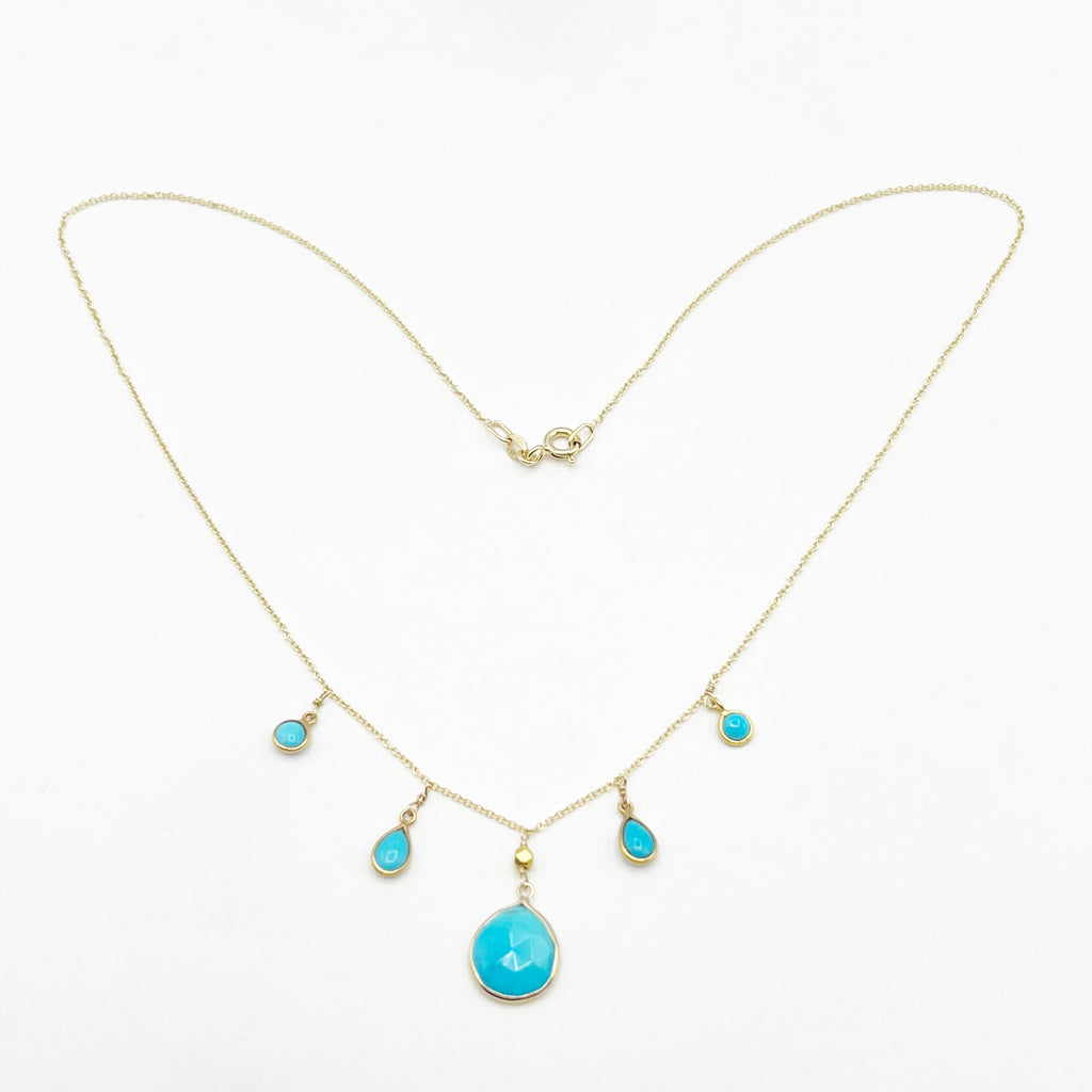 Turquoise Cascading from a Golden Chain